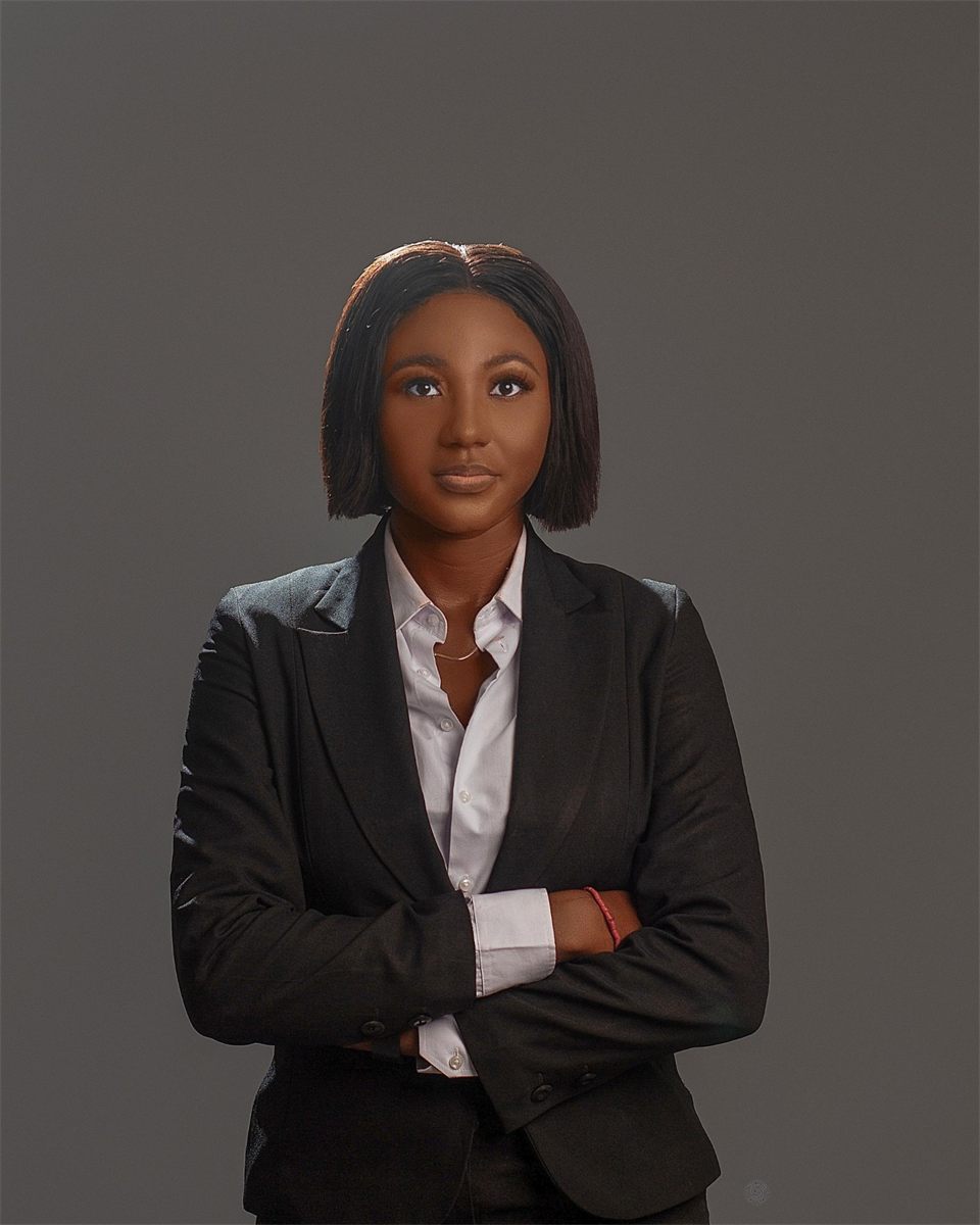 Sandra Aibangbee standing with arms folded